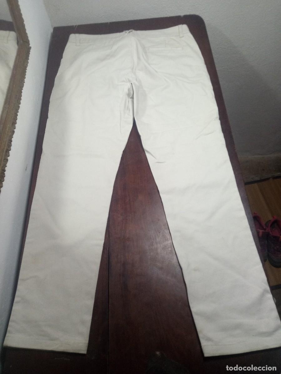 Segunda mano: Pantalones tipo chino beis de Sfera Basic. Talla 40 - Foto 2