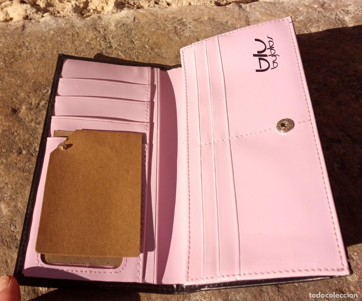 Segunda mano: Cartera tarjetero Blu Byblos. Negra y rosa. - Foto 1