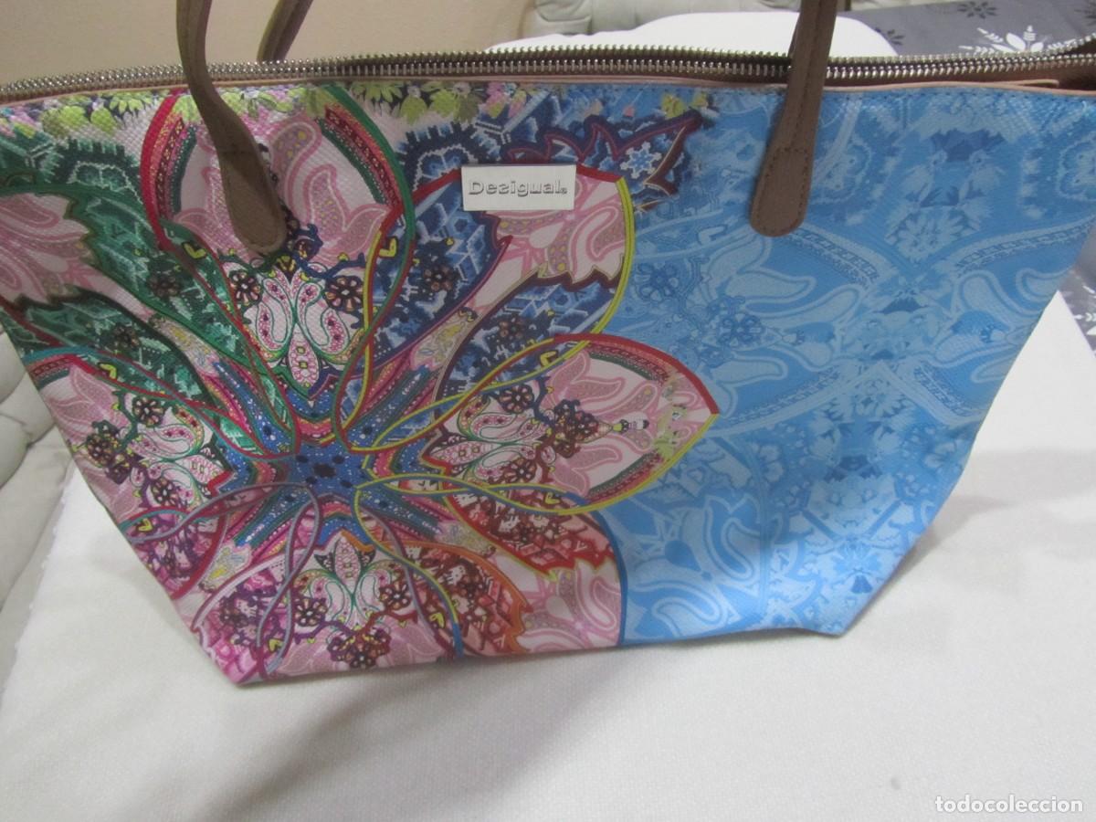 Segunda Mano: BOLSO DE ASA MARCA DESIGUAL VARIOS COLORES