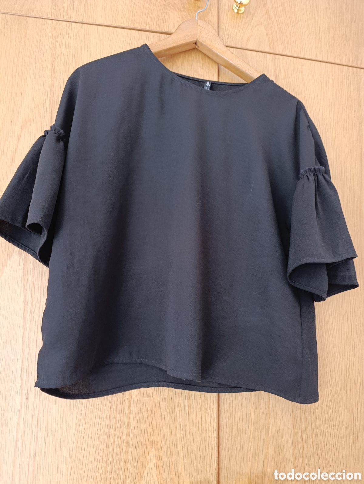 Segunda Mano: Blusa verano negra con volantes