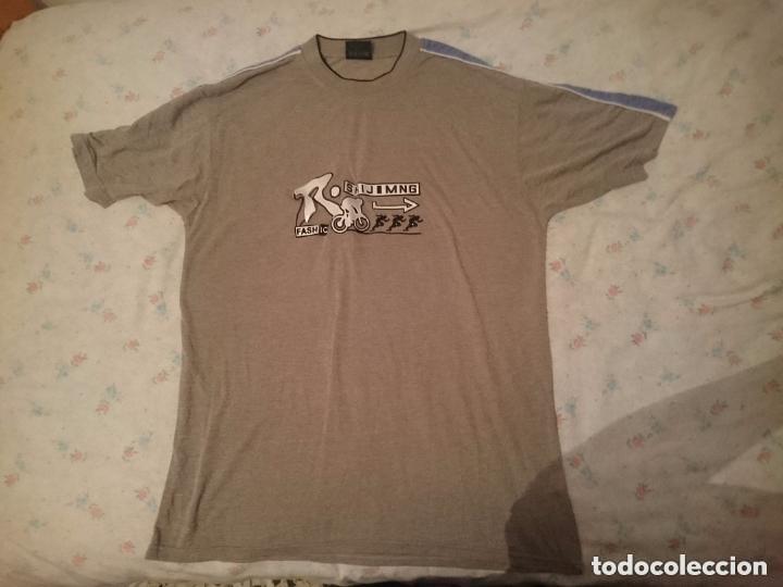 Segunda Mano: JERSEY GRIS DE MANGA CORTA -MARCA ANXIANG -LAS LETRAS ESTAN MEDIO DESPEGADAS -TALLA XL