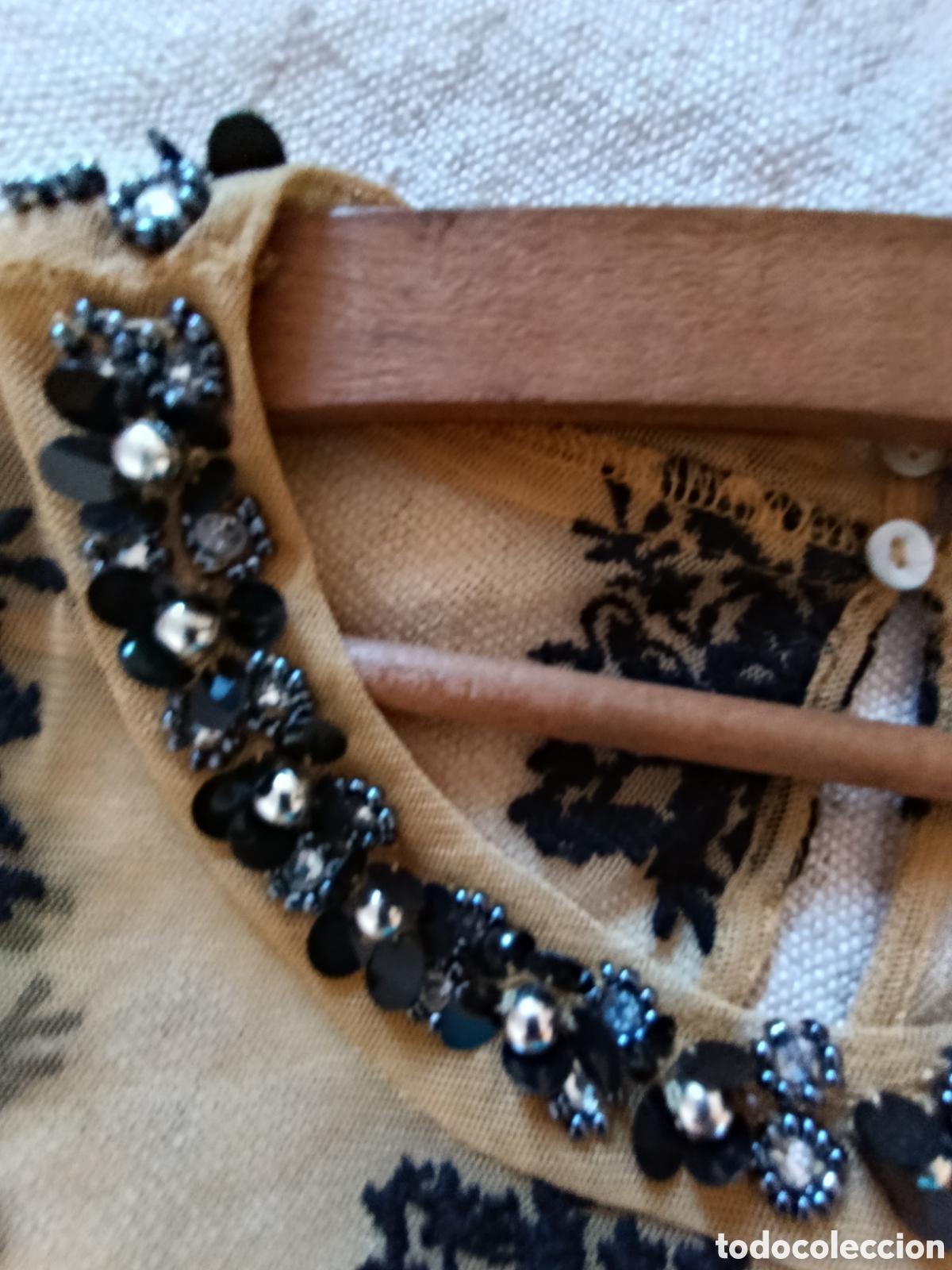 Segunda mano: Vestido t&uacute;nica con pedretia en el cuello