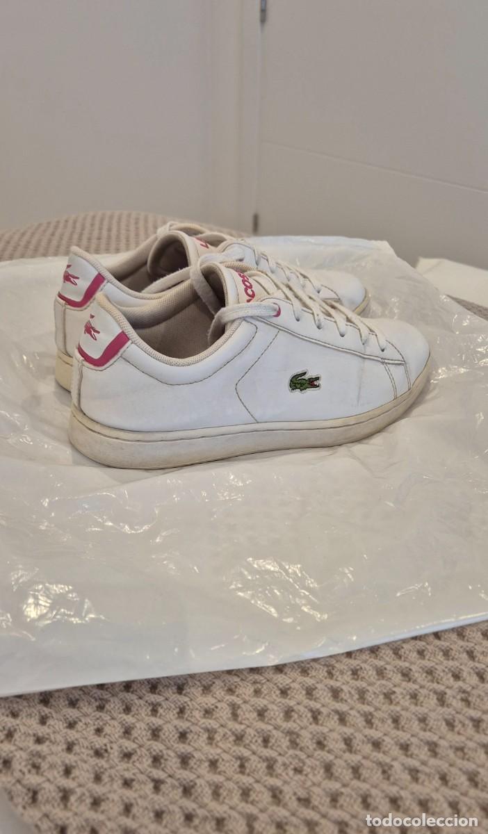 Segunda mano: Zapatillas Lacoste blancas con detalles rosas