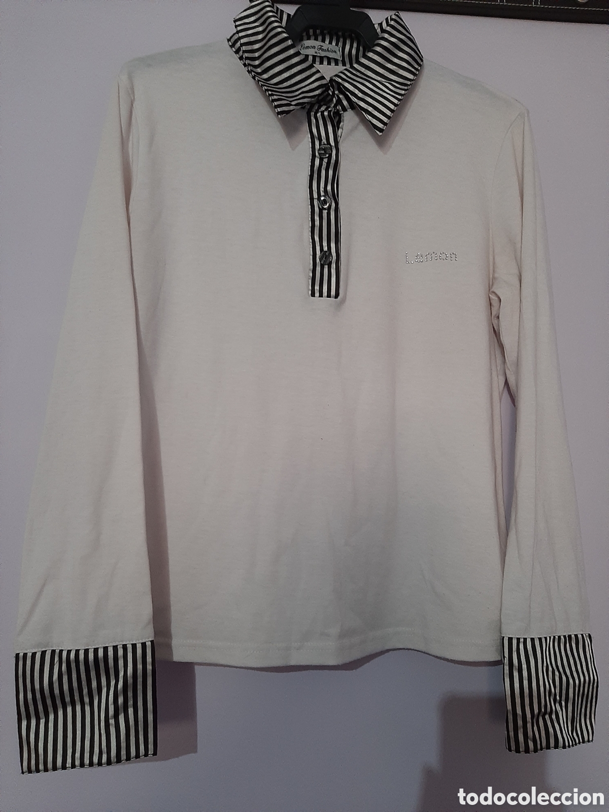 Segunda mano: Camiseta cuello camisero blanca