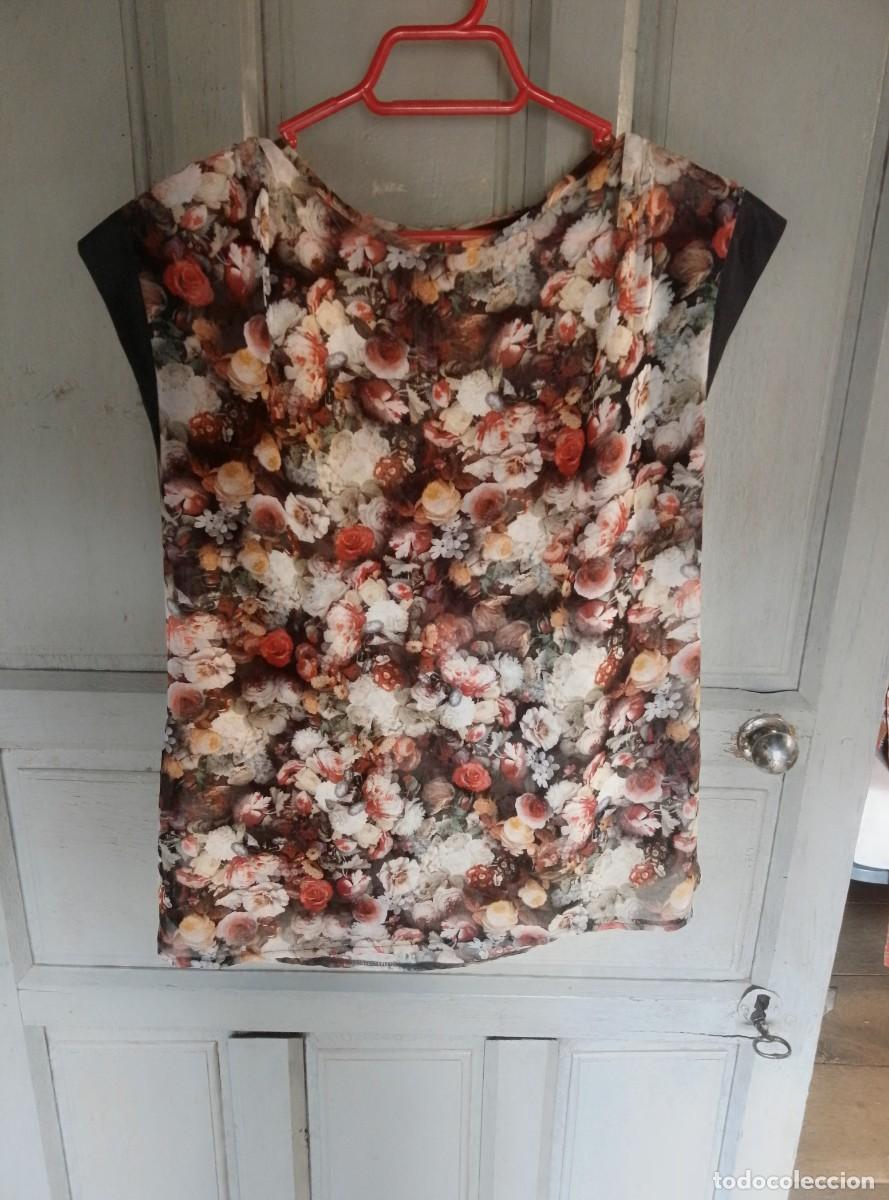 Segunda mano: Camisa blusa de flores. Manga corta. Sfera. Talla M