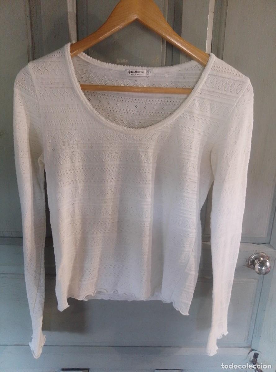 Segunda mano: Camiseta manga larga, top calado. Stradivarius. Talla L