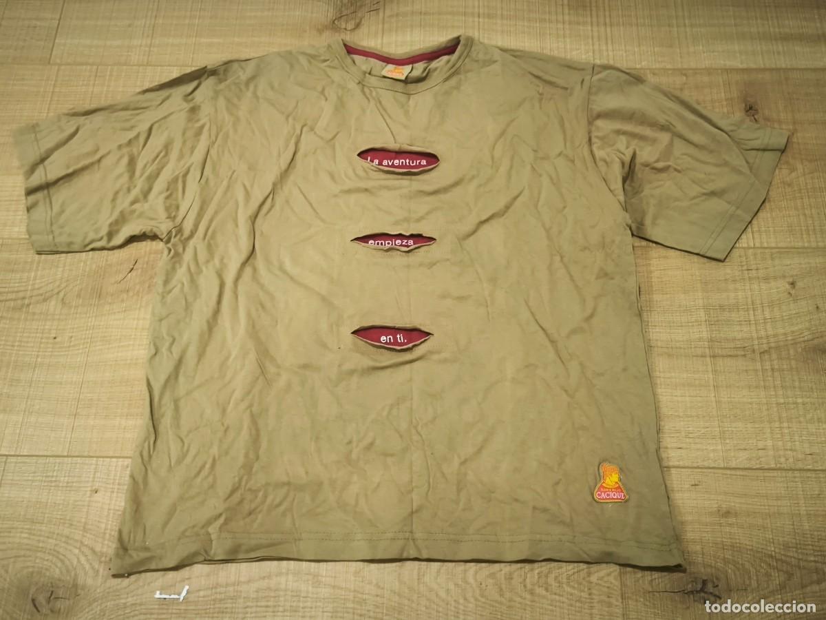 Segunda mano: Camiseta Vintage Ron Cacique Talla XL &ndash; Dise&ntilde;o &Uacute;nico Con Aberturas Y Lema Aventurero
