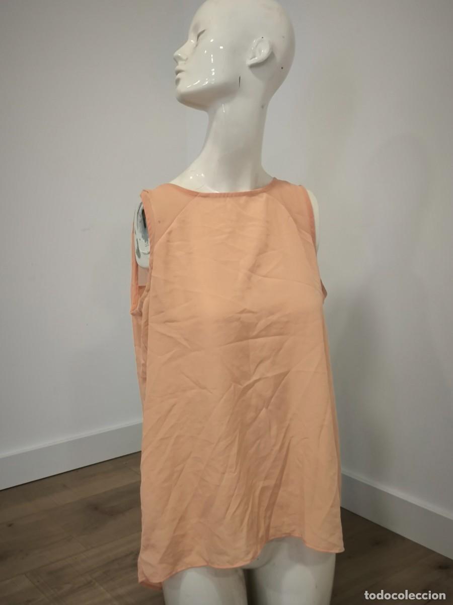 Segunda mano: Blusa Fluida Salm&oacute;n Blanco Talla XL &ndash; Ligereza Y Vuelo Para Un Look Fresco Y Elegante