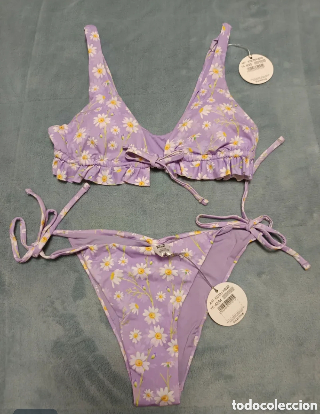 Segunda mano: Oferta!! Bonito Bikini Morado Flores Blanco Talla 40-42 A estrenar