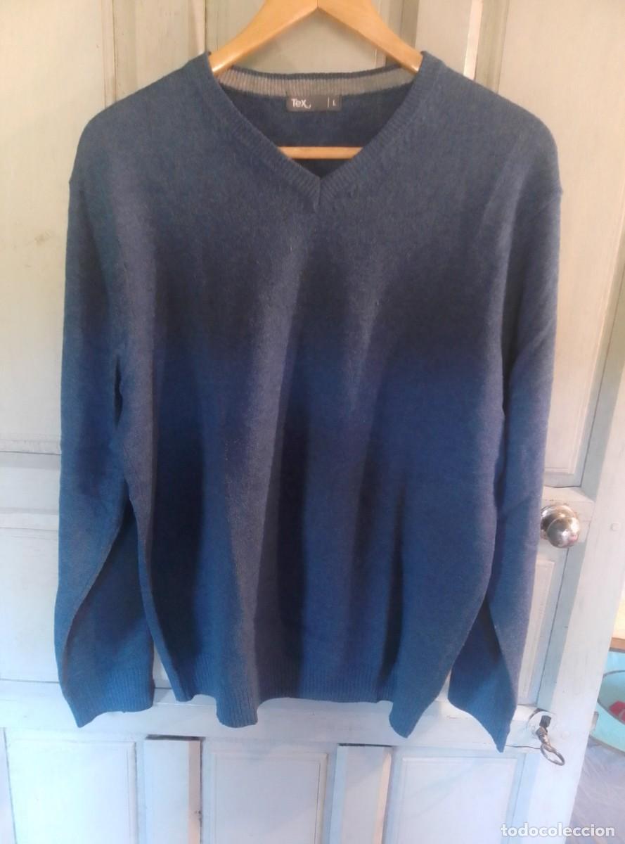 Segunda mano: Cl&aacute;sico jersey de lana y cuello de pico. Tex. Talla L