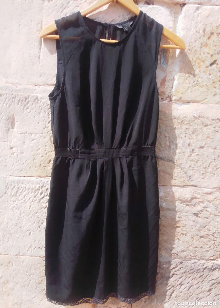 Segunda mano: Elegante y sencillo vestido negro sin mangas con detalles de encaje. H&M. Talla 36