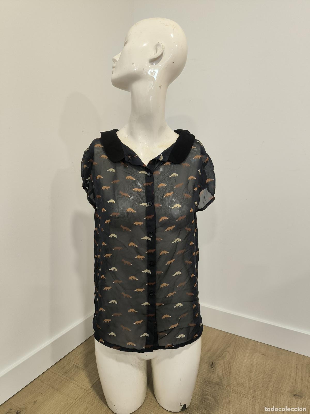 Segunda mano: Blusa Mujer Negra Transparente Talla S-M &ndash; Estampado de Dinosaurios Cuello Beb&eacute;