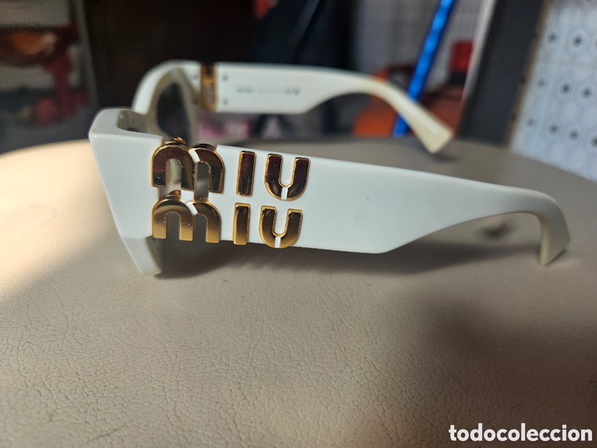 Segunda mano: Gafas De Sol Miu Miu Glimpse SMU 09W Originales - Blanco Y Dorado