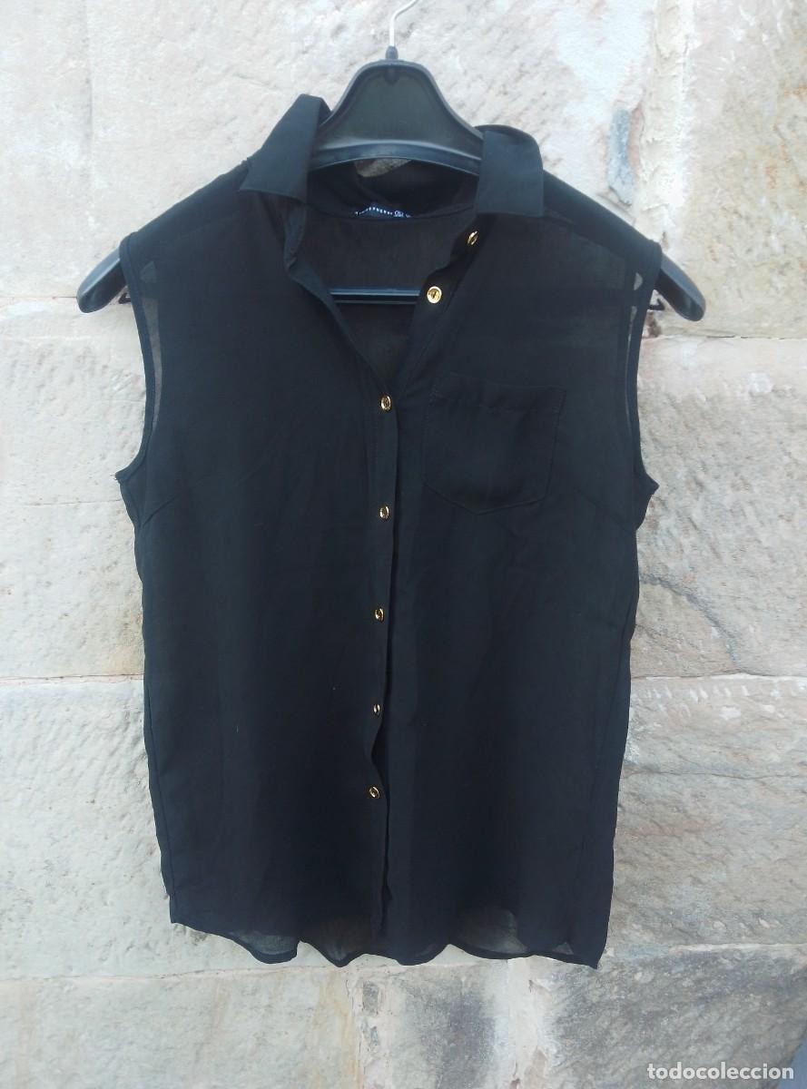 Segunda mano: Blusa sin mangas, negra, gasa. Semitransparentes. Atmosphere. Talla S