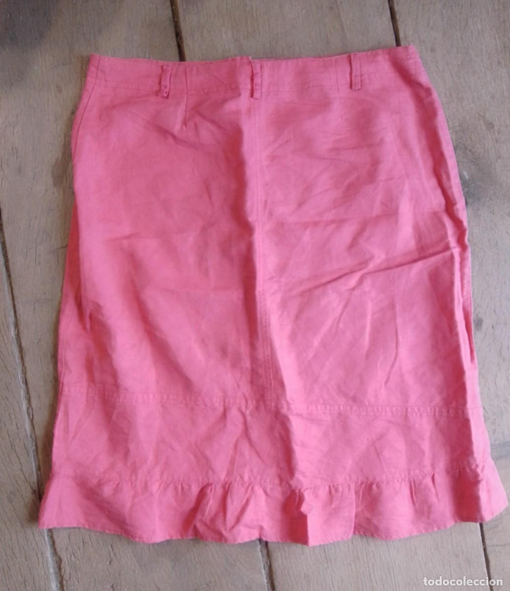 Segunda mano: Falda midi rosa con volante. Tex. Talla 42
