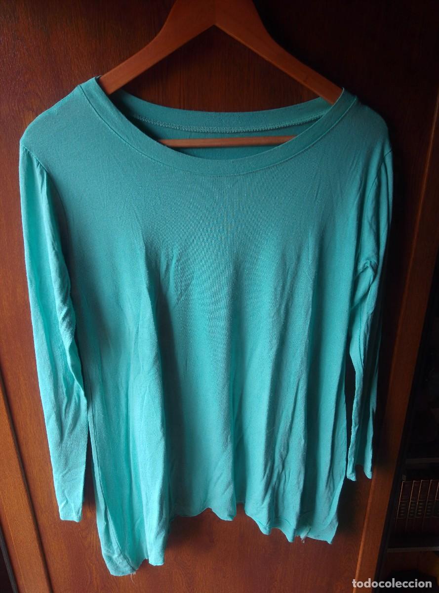 Segunda mano: Camiseta turquesa de manga larga. Viscosa. Talla L