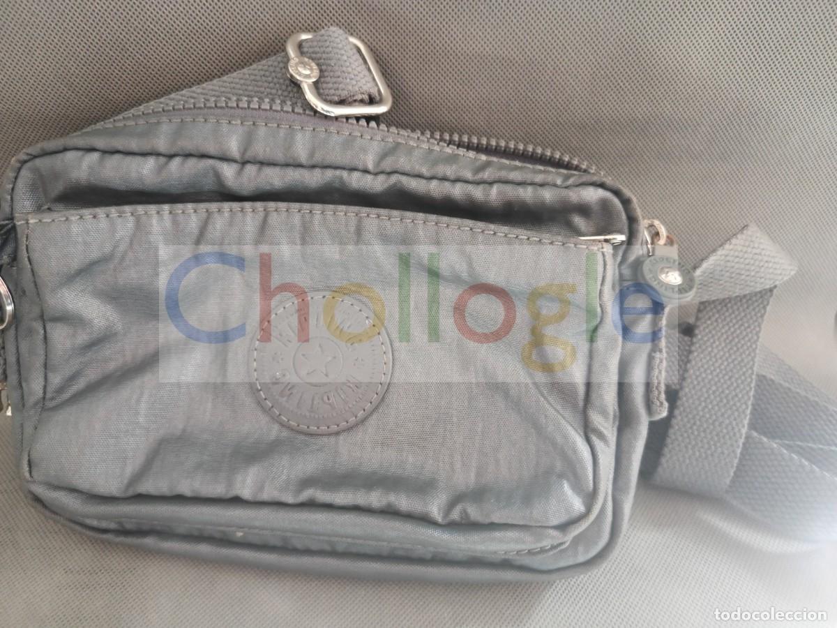 Segunda mano: Kipling bolso bandolera gris con varios compartimentos y correa ajustable