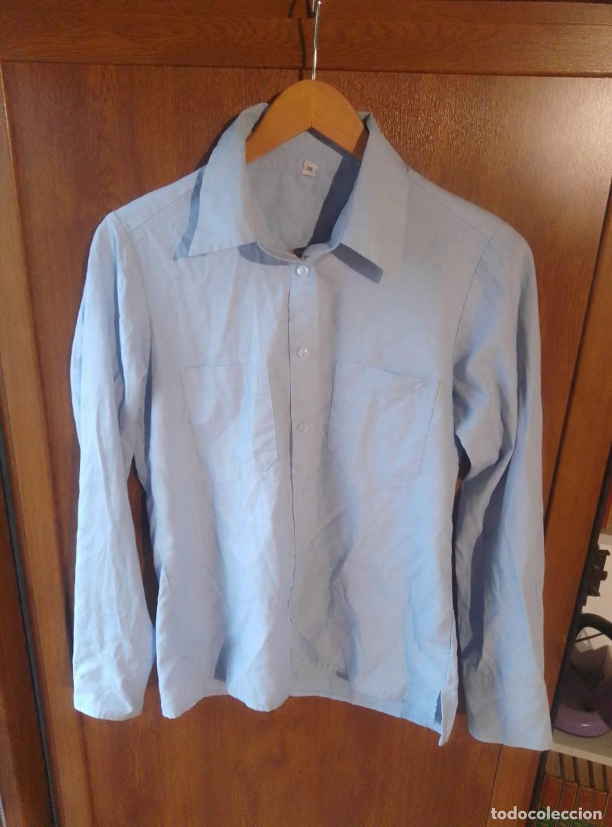 Segunda mano: Camisa manga larga azul claro. Talla 36