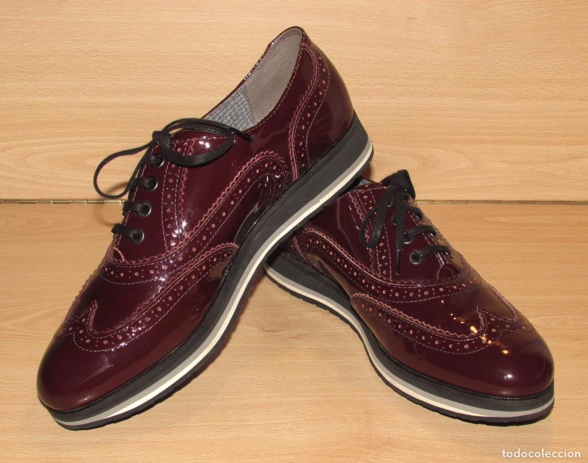 Segunda mano: Zapato acordonado blucher de estilo brogue Geox l&iacute;nea Respira piel charol burdeos talla 40