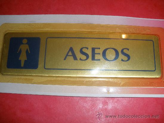 Segunda mano: Señal adhesiva, aseo para mujer.