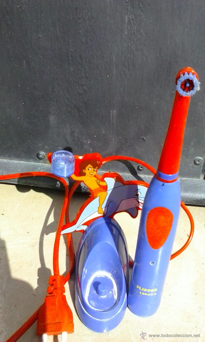 Segunda mano: CEPILLO DE DIENTES INFANTIL FLIPPER , ELECTRICO RECARGABLE NO FUNCIONA . - Foto 1