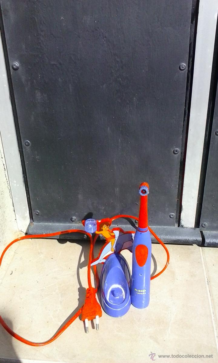 Segunda mano: CEPILLO DE DIENTES INFANTIL FLIPPER , ELECTRICO RECARGABLE NO FUNCIONA . - Foto 2