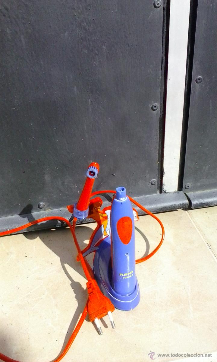 Segunda mano: CEPILLO DE DIENTES INFANTIL FLIPPER , ELECTRICO RECARGABLE NO FUNCIONA . - Foto 3