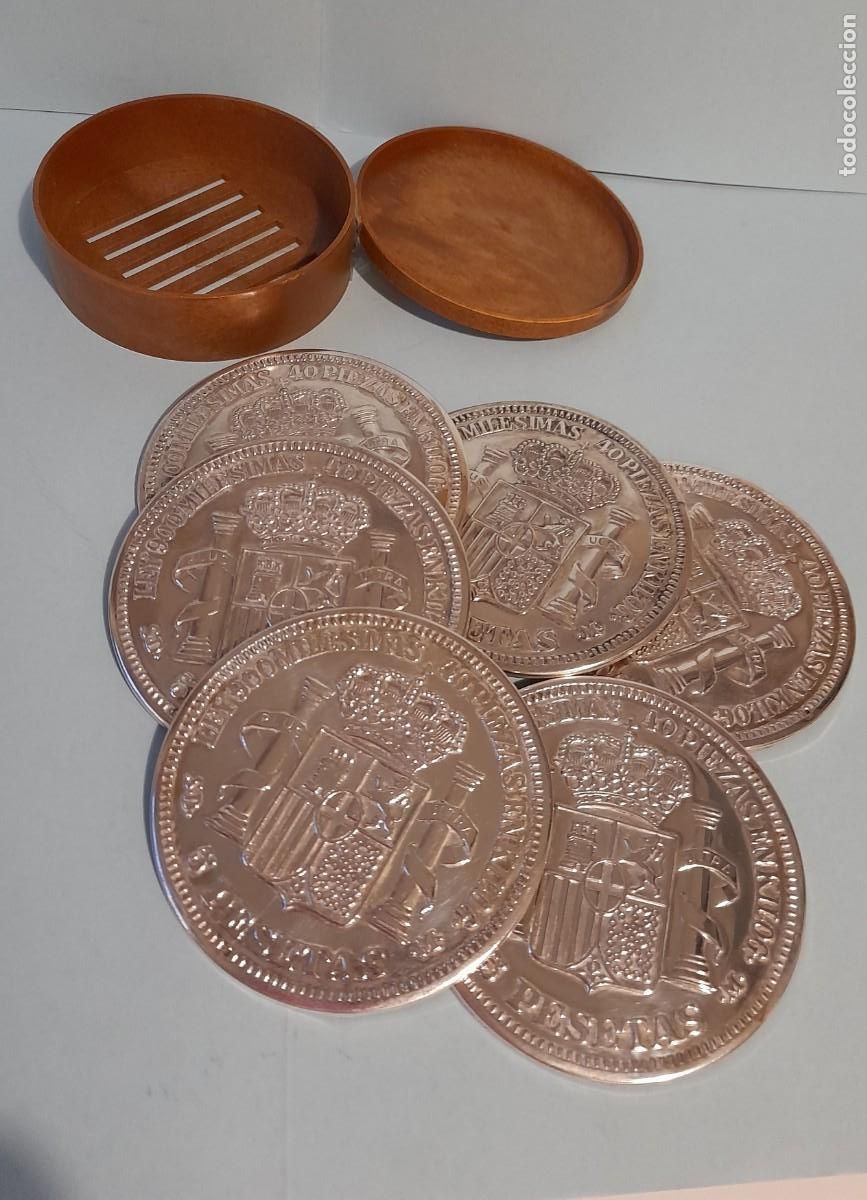 Segunda mano: Juego 6 Posavasos con forma moneda Escudo de Espa&ntilde;a 5 Pesetas, en su estuche de pl&aacute;stico