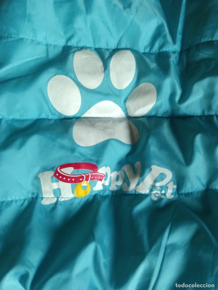 Segunda mano: Abrigo para perro con capucha. Azul. Huellas. Forro. 45 cm. - Foto 2