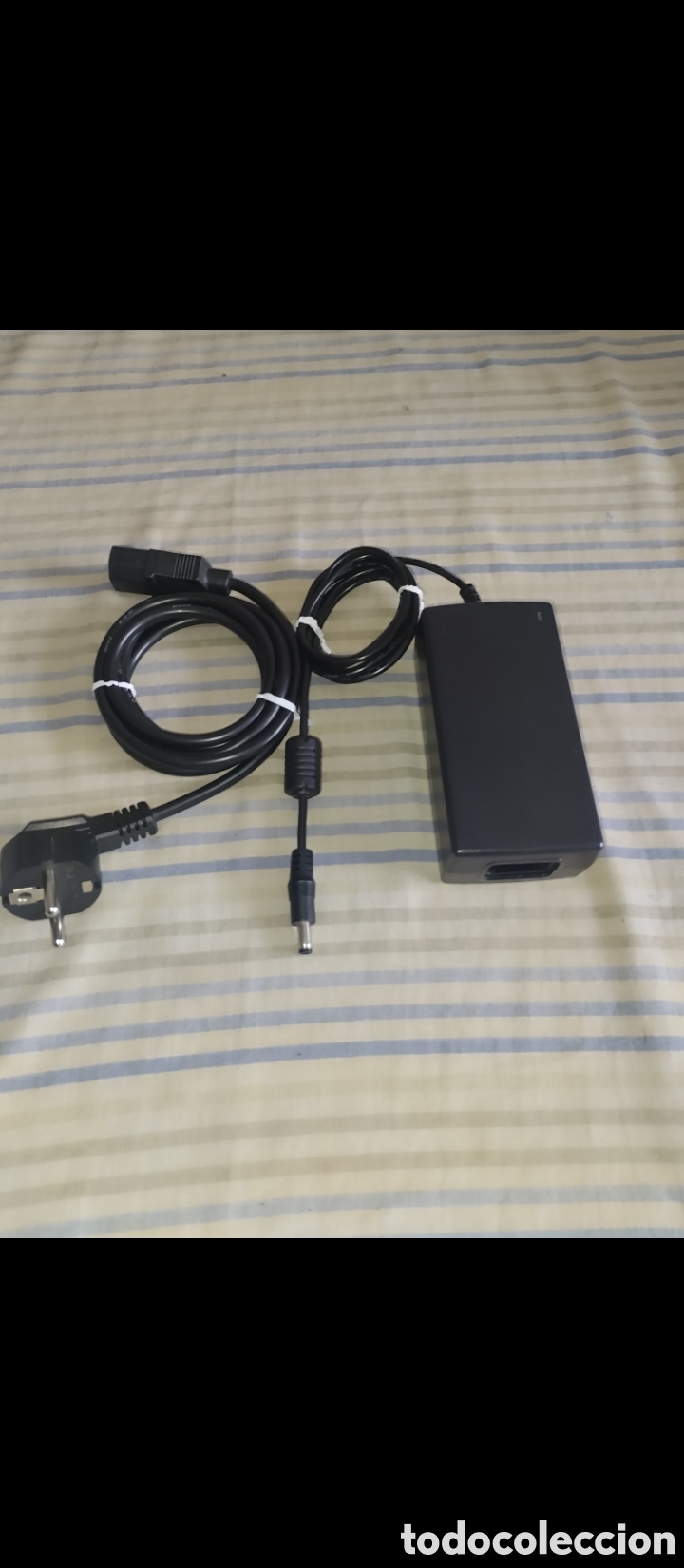 Segunda mano: Adaptador de Corriente marca TECH. modelo.STD-1203. - Foto 1