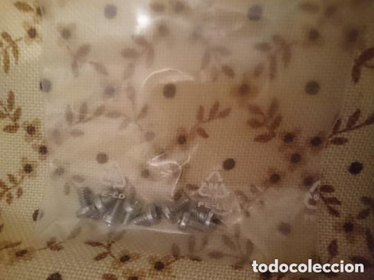 Segunda mano: BOLSA DE TORNILLOS DE ESTRELLA PEQUE&Ntilde;OS -a&ntilde;os 80 - Foto 1