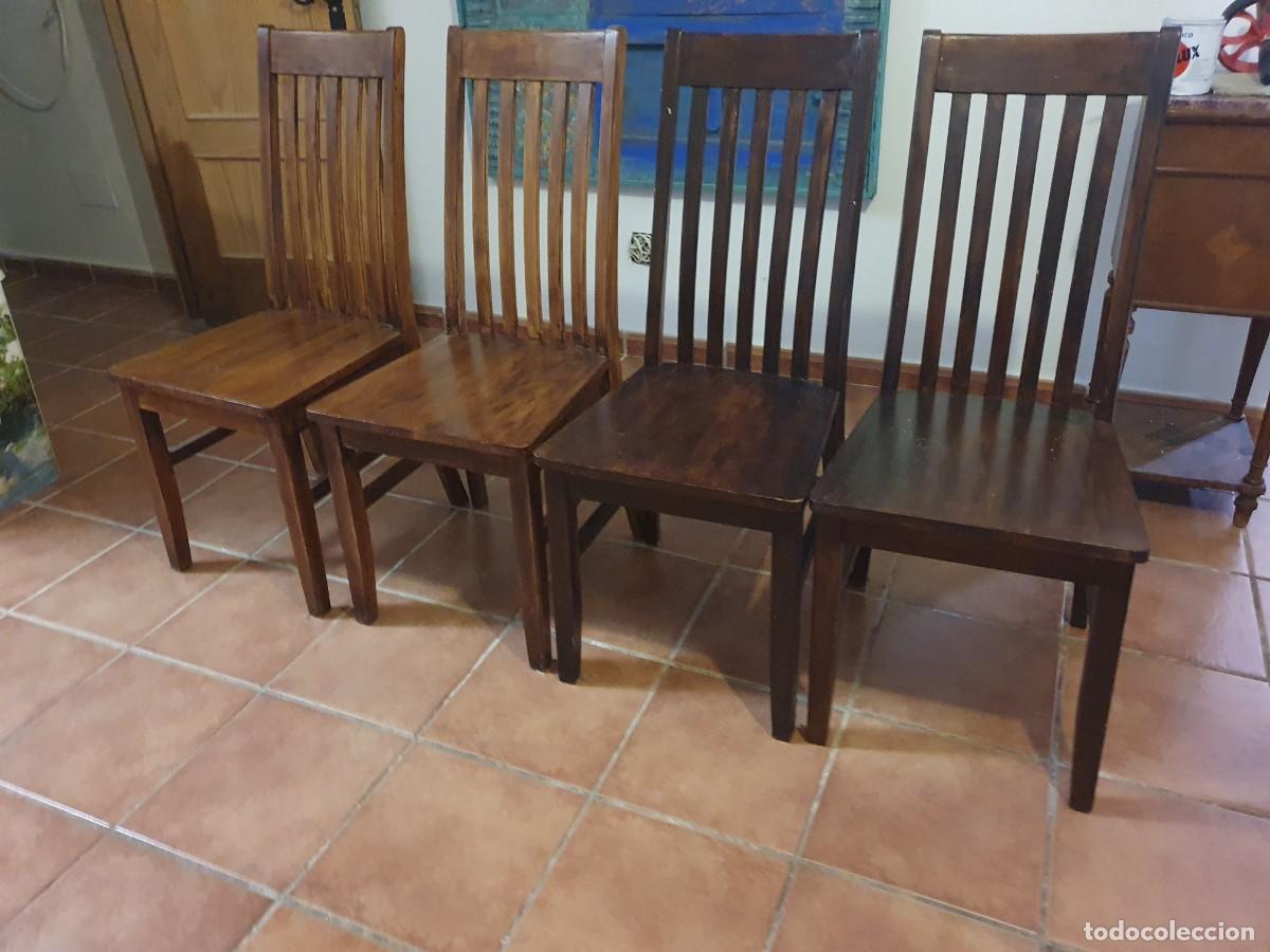 Segunda mano: Conjunto de 4 sillas de madera macizas - Foto 1