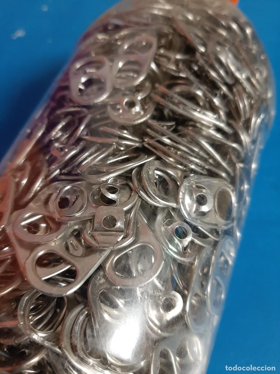 Segunda mano: Botella llena de anillas - Foto 3
