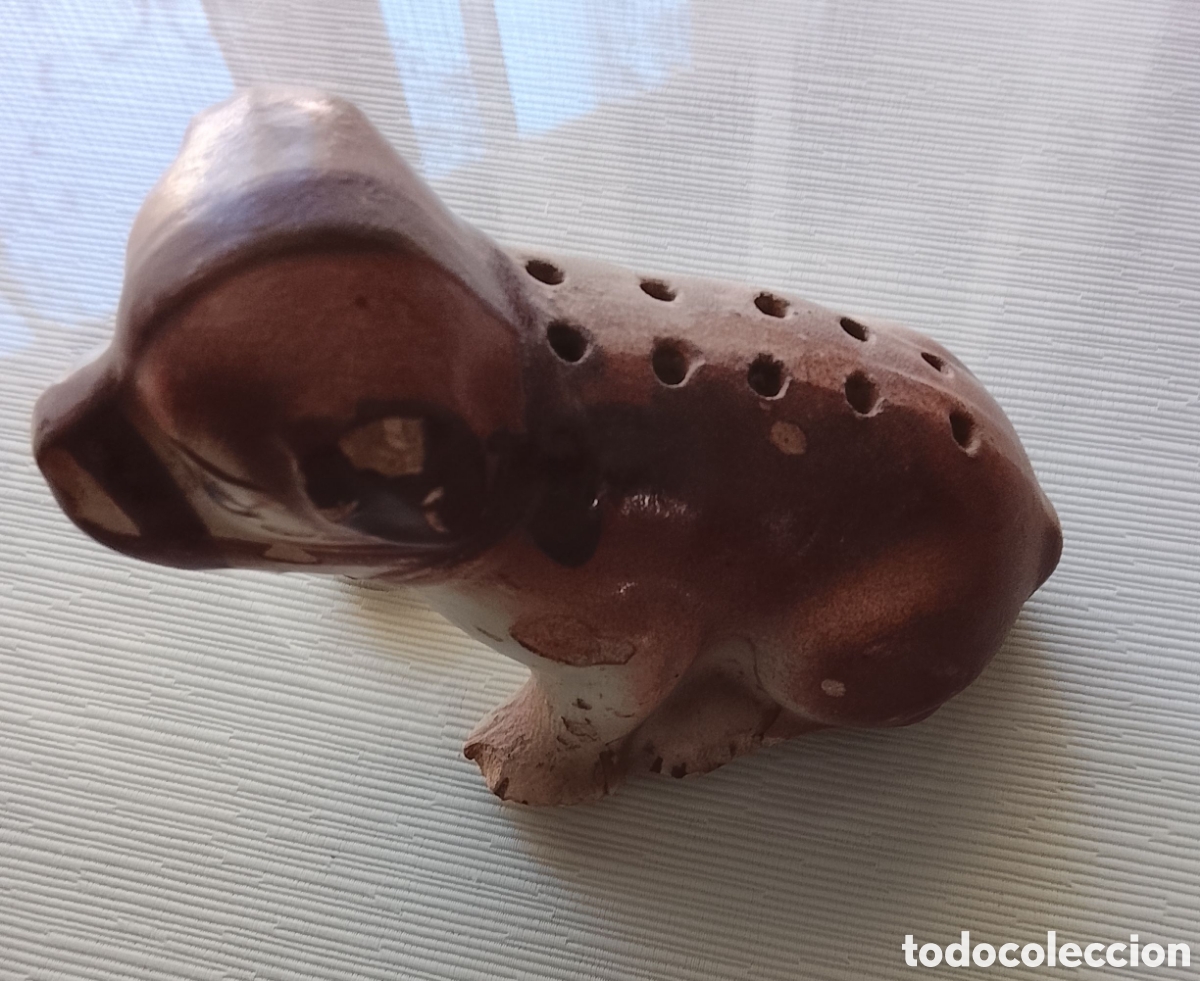 Zweite Hand: Muy antiguo perrito para poner los palillos.