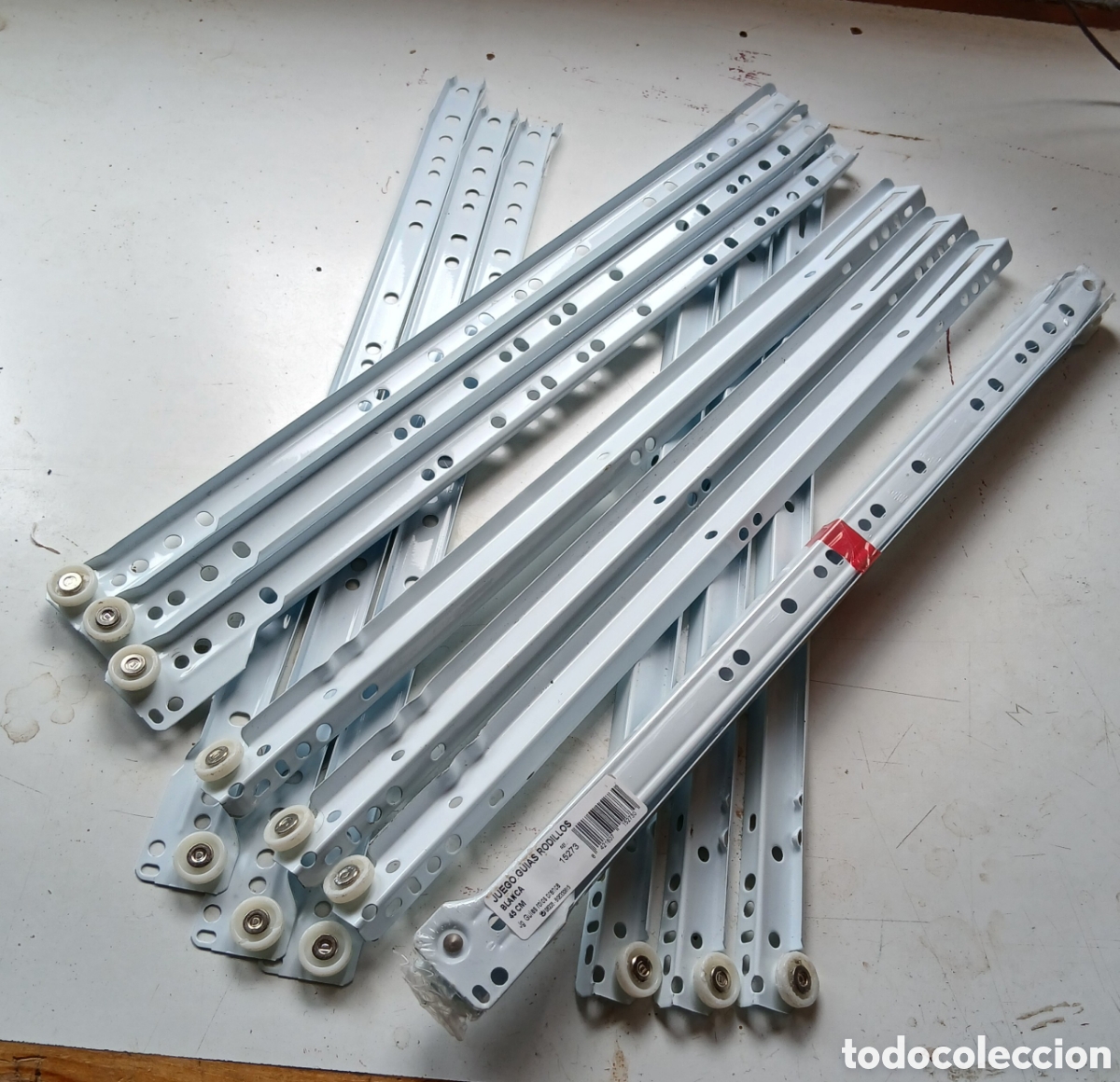 Segunda Mano: 4 juegos guias rodillos cajoneras, 45 cm.