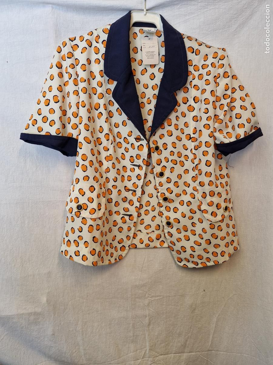 Segunda Mano: BONITA CAMISA PARA MUJER MANGA CORTA. COLOR BLANCA-NARANJA. TALLA 42