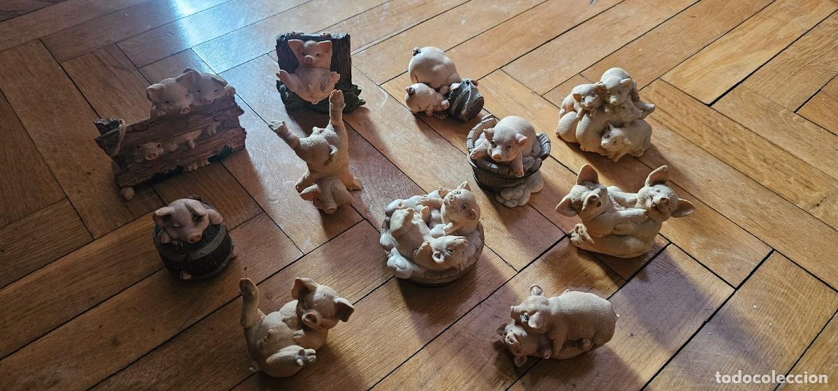 Segunda Mano: Interesante colecci&oacute;n de cerditos en diferentes poses de resina