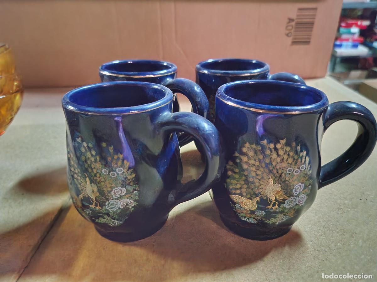 Segunda Mano: 4 BONITAS TAZAS DE CERAMICA. COLOR AZUL.