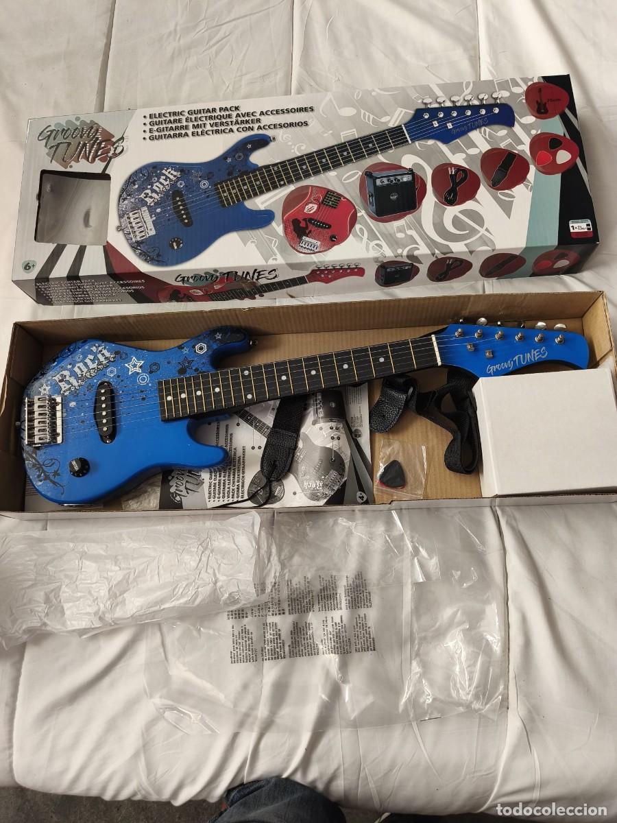 Segunda Mano: guitarra el&eacute;ctrica infantil con amplificador . Groovy Tunes . Nuevo en caja original
