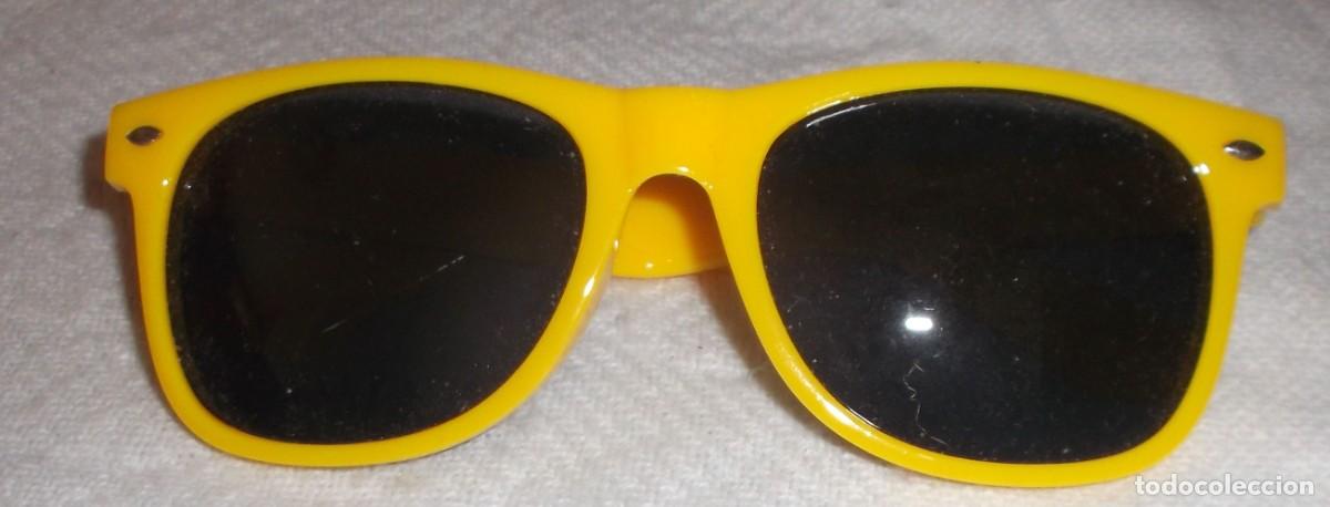 Segunda mano: gafas de sol montura plastico amarilla