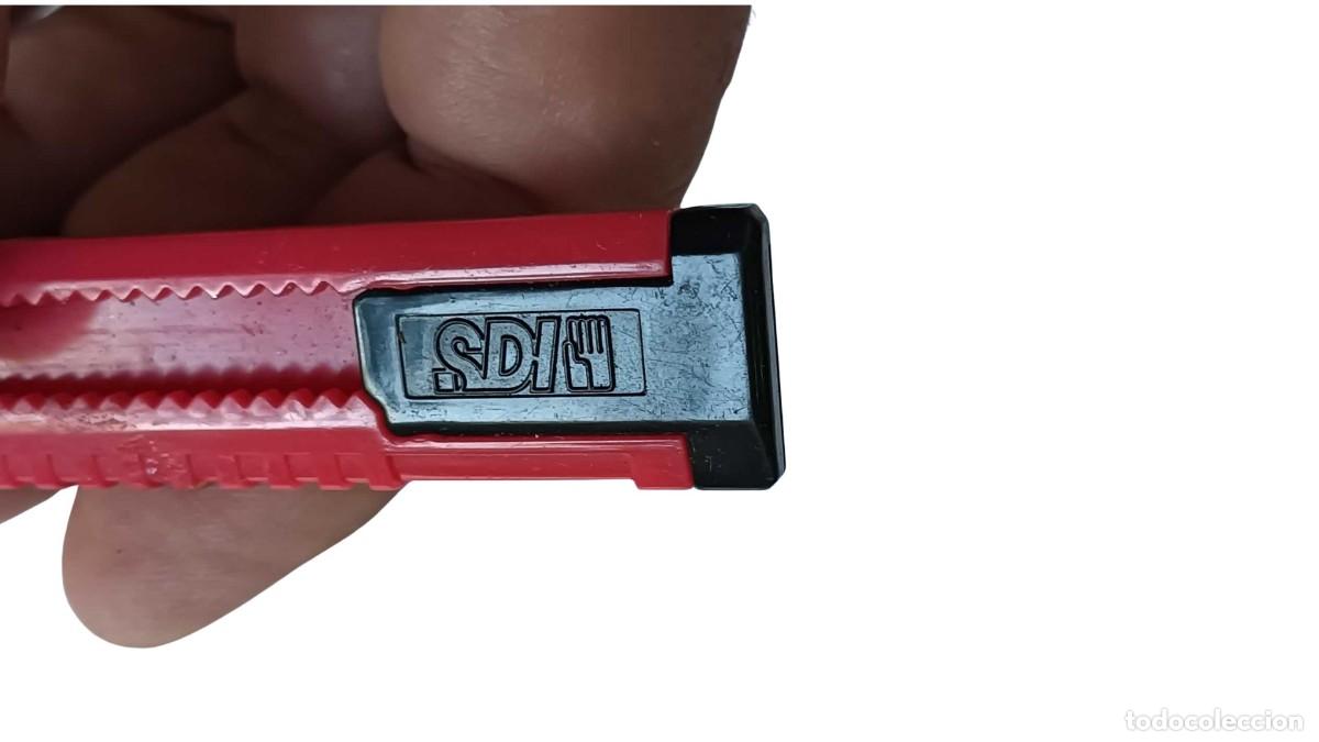 Segunda mano: C&Uacute;TER MULTIUSOS SDS ROJO Y NEGRO - CUCHILLA RETR&Aacute;CTIL - Foto 2