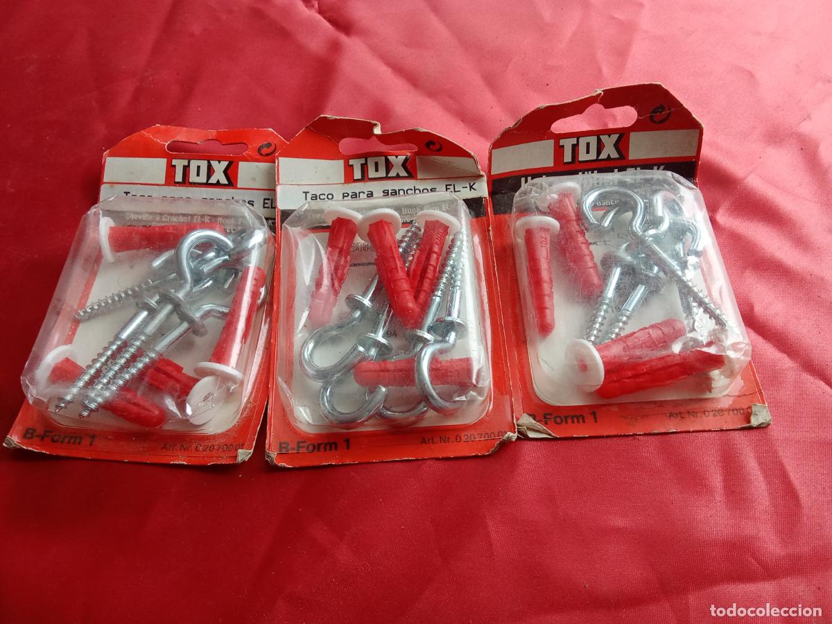 Segunda mano: Lote de tacos y ganchos para colgar tres cajas sin abrir, marca TDX. Caja Tornillos