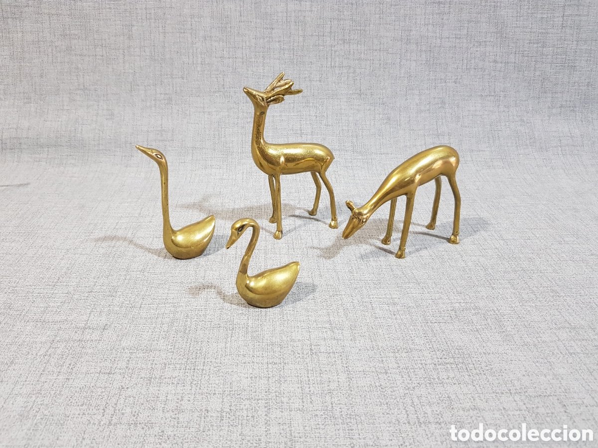 Segunda mano: JUEGO DE CIERVOS Y CISNES DE METAL COLOR BRONCE. DECORATIVOS FIGURAS DORADAS