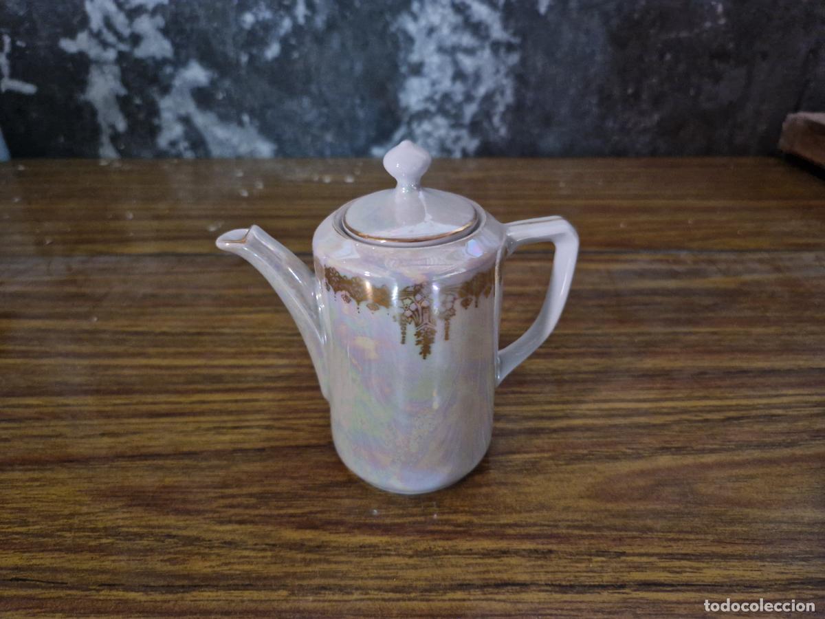 Segunda mano: BONITA MINI TETERA DE CERAMICA.