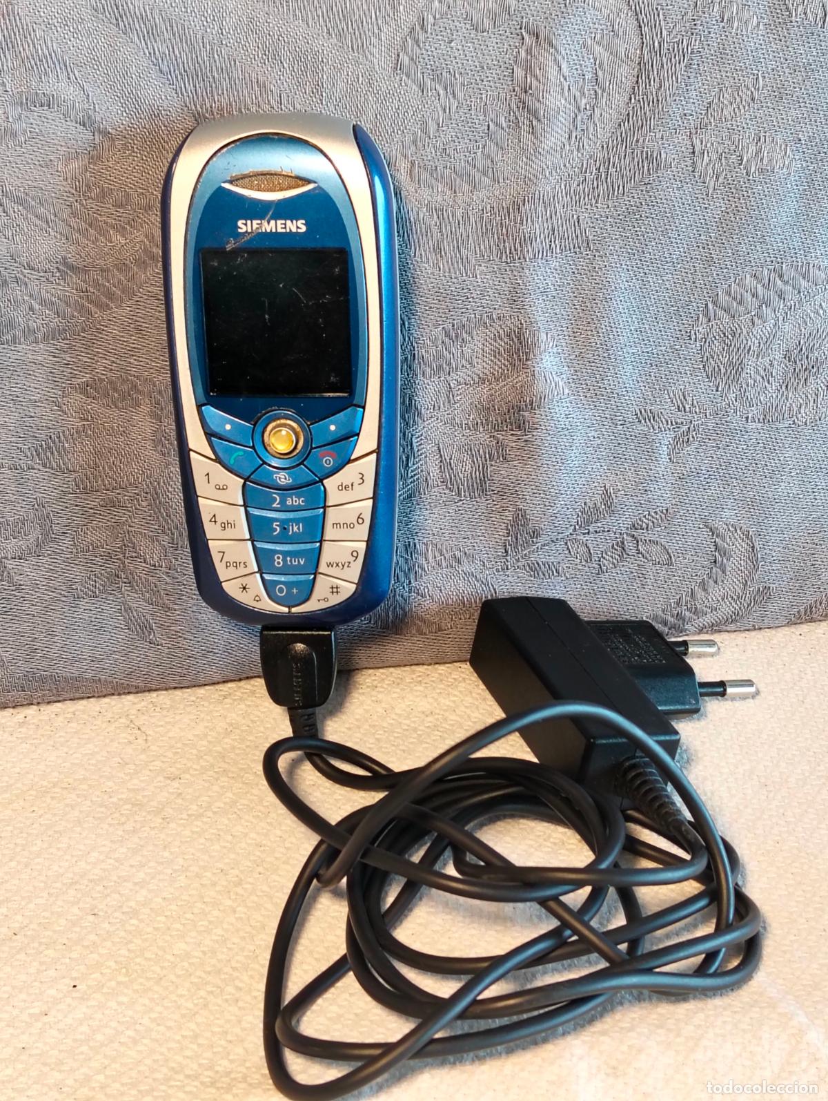 Zweite Hand: Tel&eacute;fono m&oacute;vil mobil siemens c65 c5 azul plateado antiguo con cargador no funciona