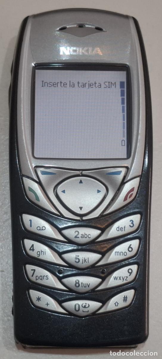 Segunda mano: TELEFONO M&Oacute;VIL NOKIA 6100 CON SU FUNDA DE PIEL ORIGINAL DE NOKIA