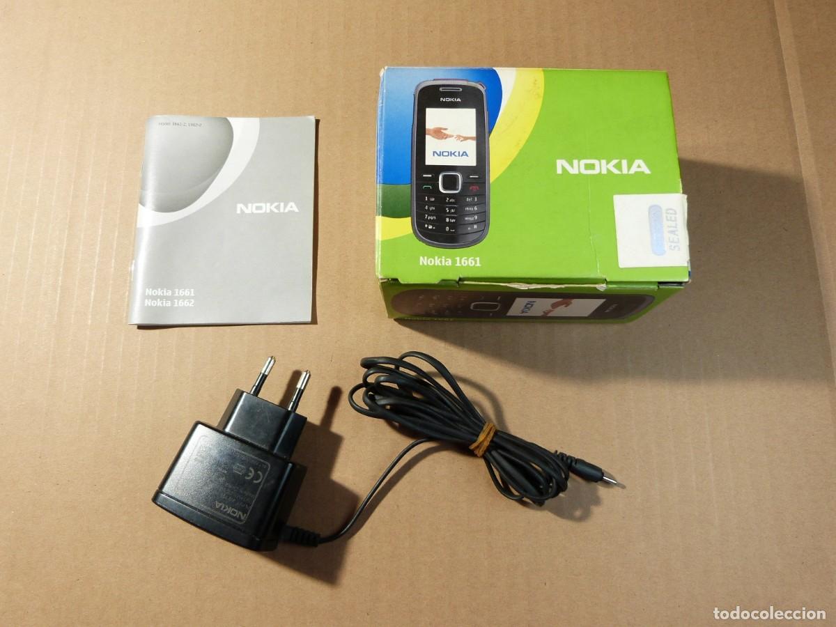Segunda mano: Caja manual y cargador del telefono movil NOKIA 1661