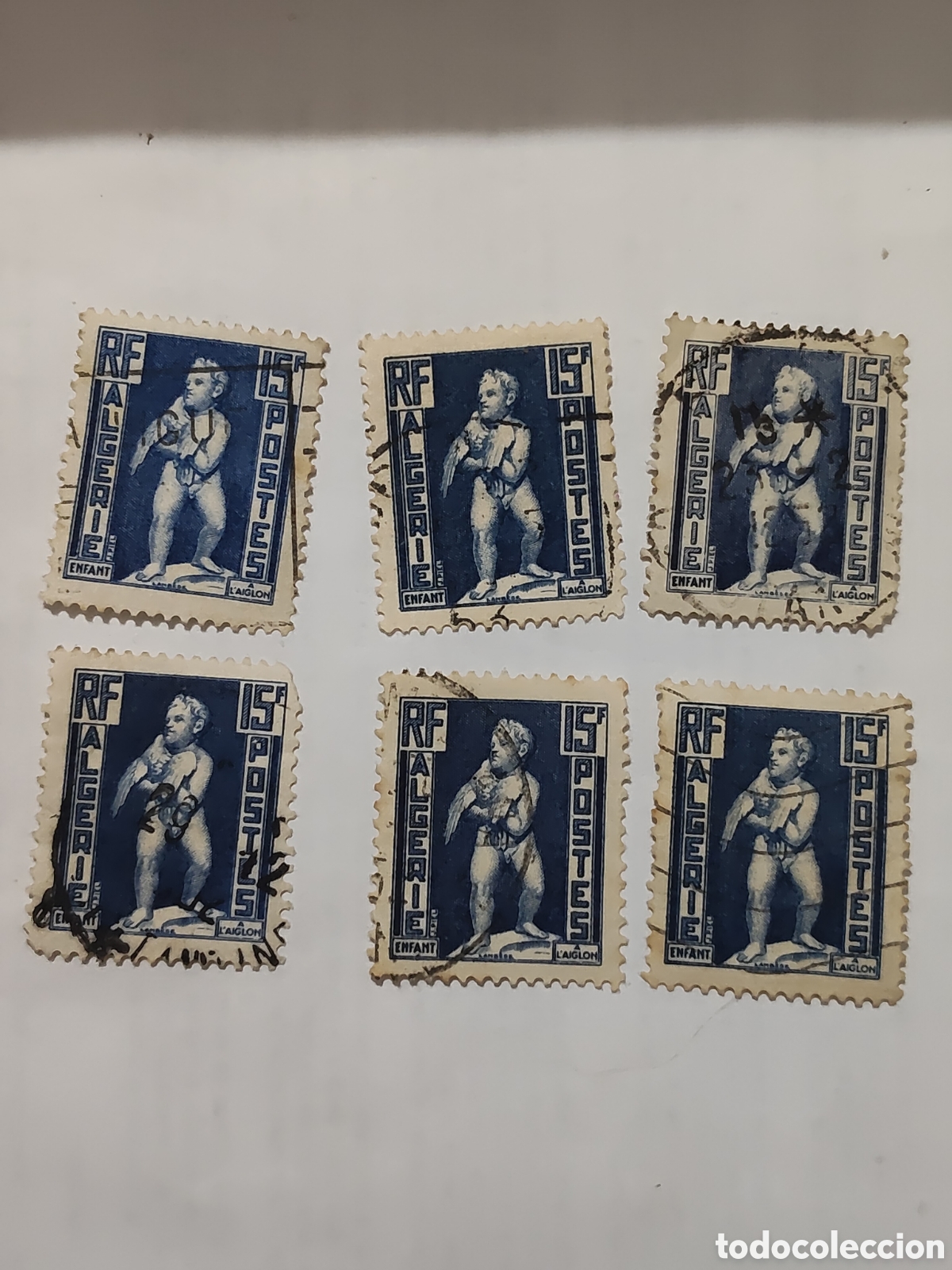 Sellos: 6 sellos de Argelia figura de un ni&ntilde;o con un &aacute;guila 1952 usado