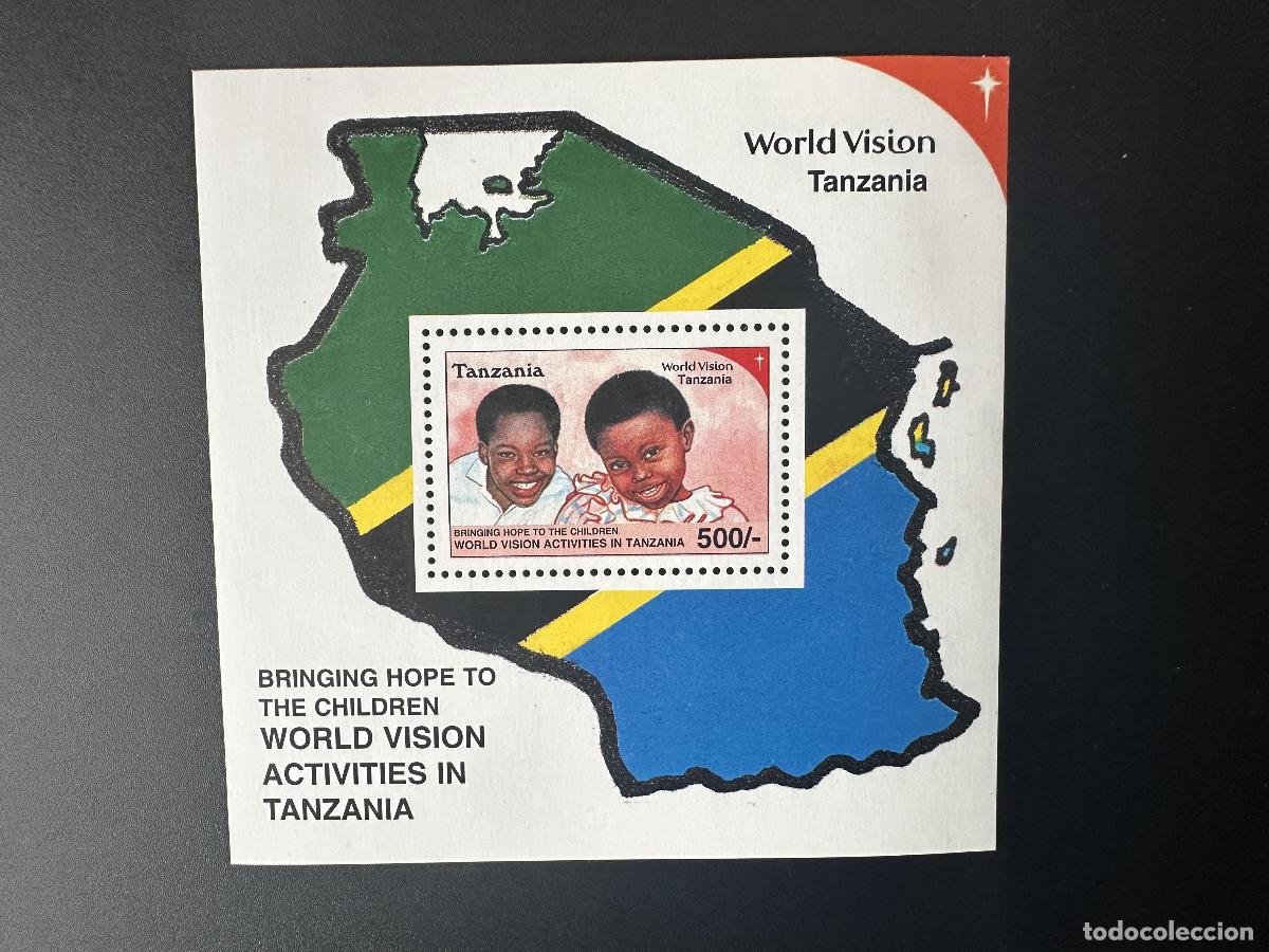 Sellos: Tanzania 2000 Mi. Tarjeta con la bandera de ayuda humanitaria para ni&ntilde;os World Vision Bl. 522