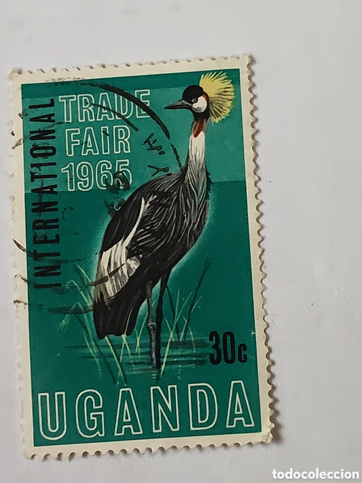 Sellos: Sello de Uganda Feria comercial internacional Grulla coronada 1965